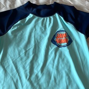 New without tags boys Carter's rash guard